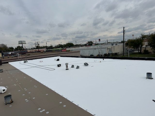 Roof replacement at 802–806 North Gray Street